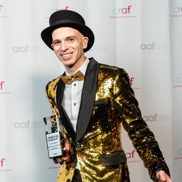 Rich Akullian on the Red Carpet with a Silver ADDY won at the 2023 ADDYs